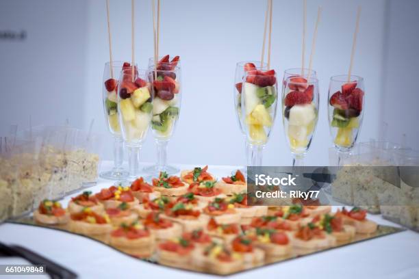 A Plate Full Of Little Snack Anda Glasses Of Fruit Stock Photo - Download Image Now - Appetizer, Apple - Fruit, Basket