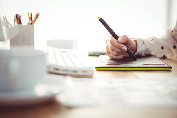 istock Cropped image of woman using graphics tablet 661050362