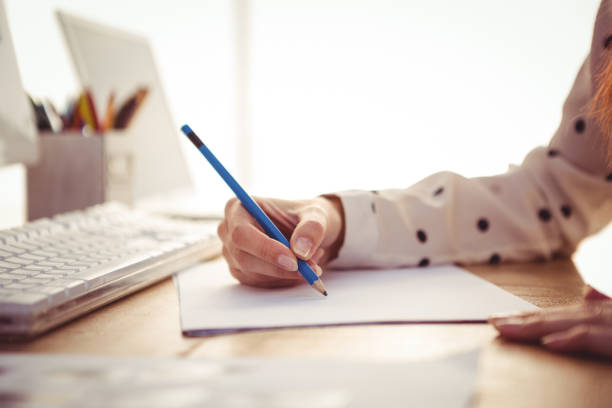 istock Cropped image of woman drawing 661056364