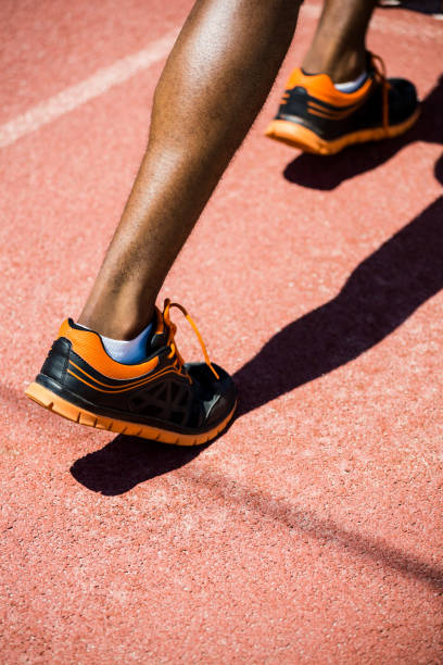 istock Athlete feet running on the running track 661056670