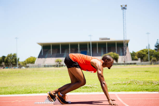 istock Athlete on a starting block about to run 661065474