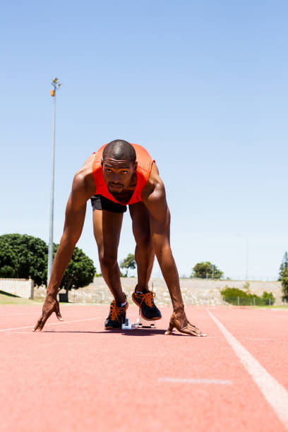 istock Athlete on a starting block about to run 661065676
