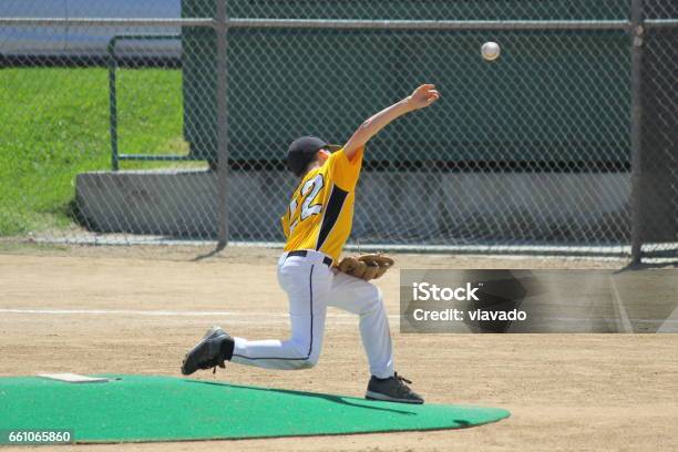 Pitching A Strike In Youth Baseball Stock Photo - Download Image Now - Youth Baseball, Baseball Pitcher, Baseball - Ball