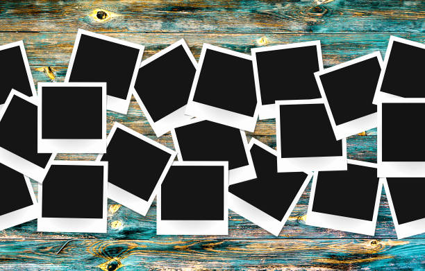 istock Photo frames pack on old painted vintage wooden background 661083424