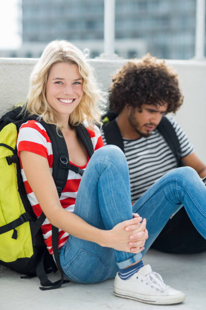istock Beautiful woman smiling at camera 661091128