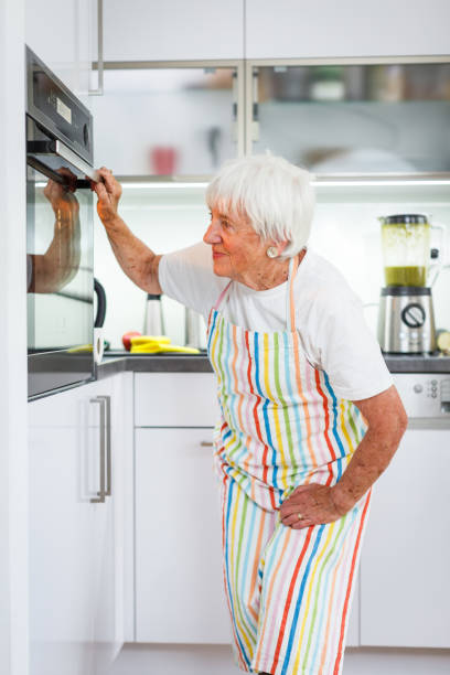istock Senior woman cooking in the kitchen 661103890
