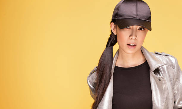 istock Young fashionable asian girl posing. 661120892
