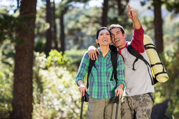 istock Couple pointing and hiking 661143370
