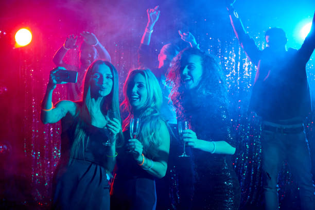 istock Selfie with friends at party 661146644
