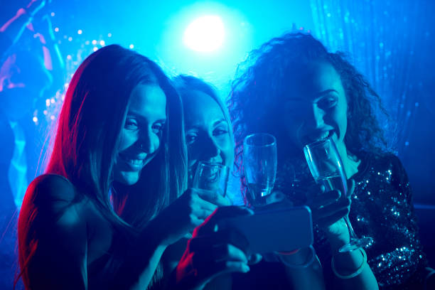 istock Pretty women with flutes 661148836