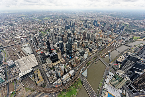 Aerial view over Melbourne CBD under overcast skies (Victoria, Australia)