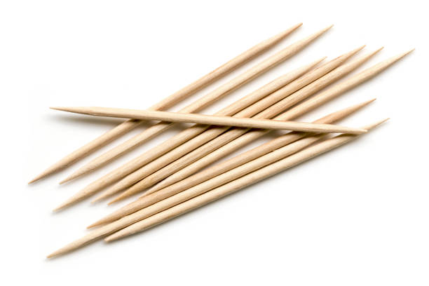 Toothpicks Isolated Top View Toothpicks isolated on white.  Top view. cocktail stick stock pictures, royalty-free photos & images