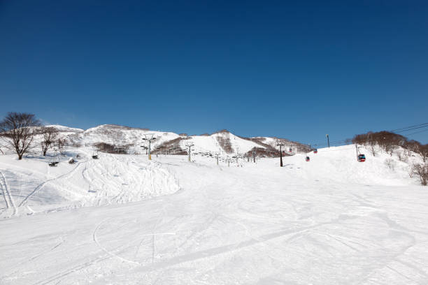 istock Skiers enjoying skiing on a clear bright sunny day 661201712