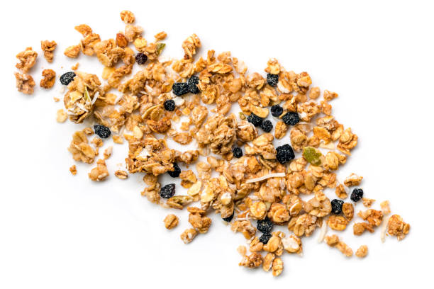 istock Muesli or Granola Scattered on White Top view 661218696