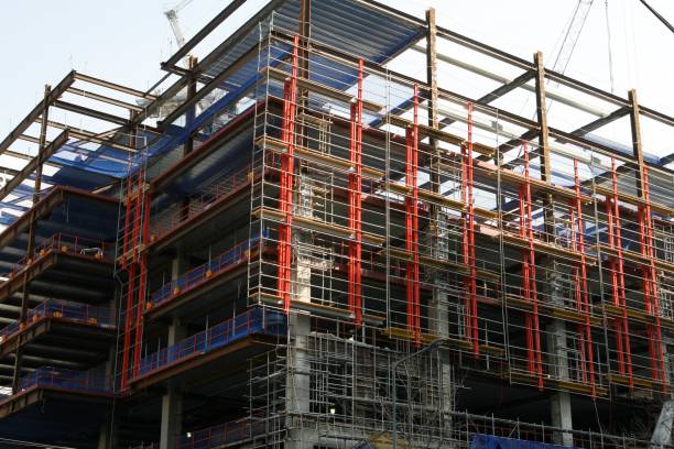 istock Unfinished steel frame building at a construction site 661219574