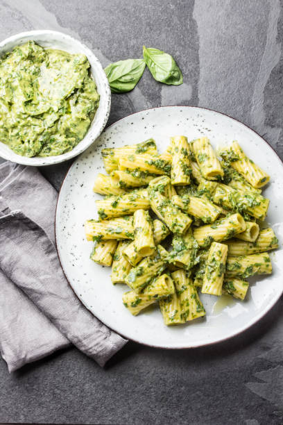 istock Vegetarian pasta with avocado and herb sauce 661236882