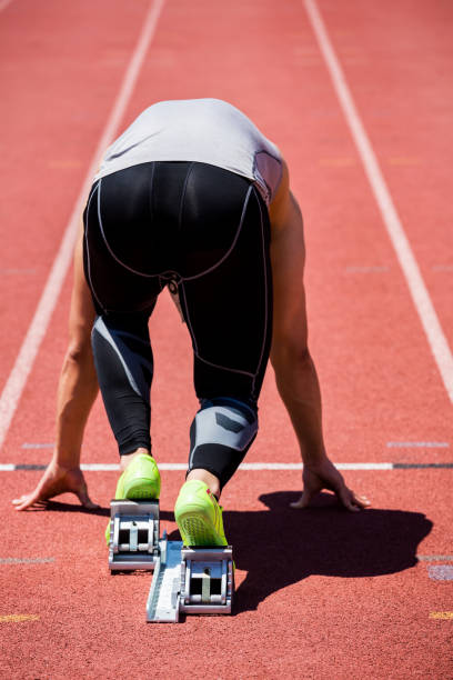 istock Athlete on a starting block about to run 661246788