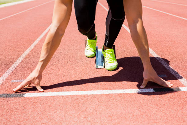 istock Athlete on a starting block about to run 661248680