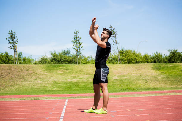 istock Ahtlete posing after victory 661277674