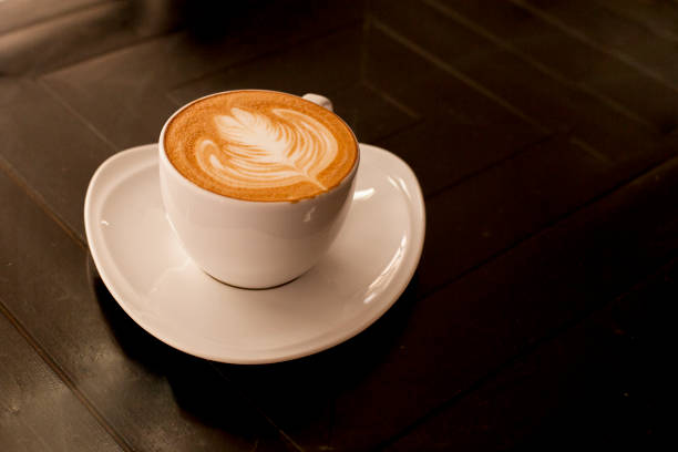 istock Coffee cup of cafe latte with latte art on top 661318102