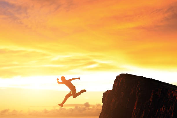 istock man jump in moutain 661359068