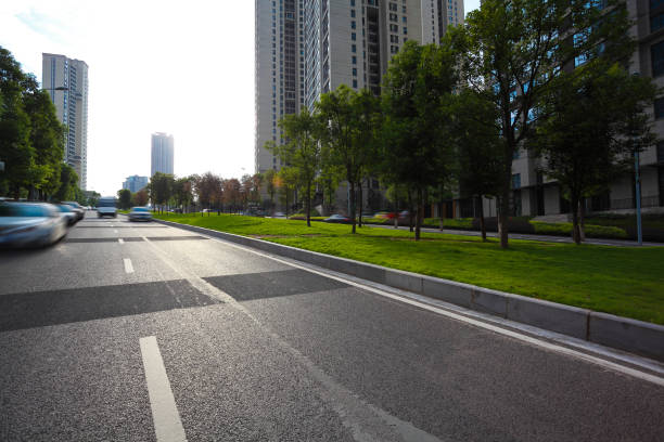istock Empty road surface floor with City streetscape buildings 661359290
