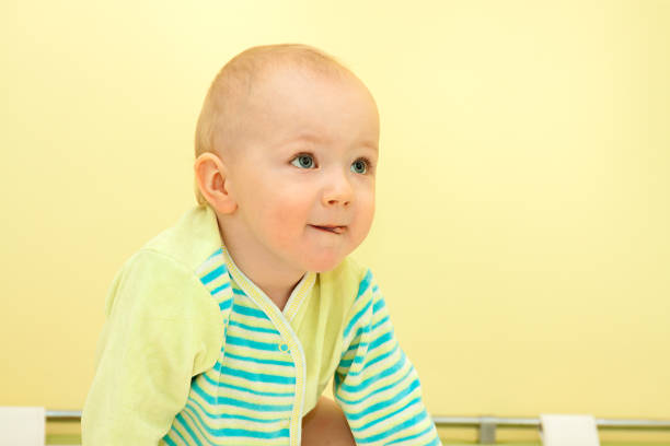 istock small beautiful child boy attentively looking 661393268