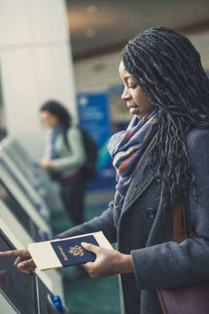 istock Young woman at airport 661409376