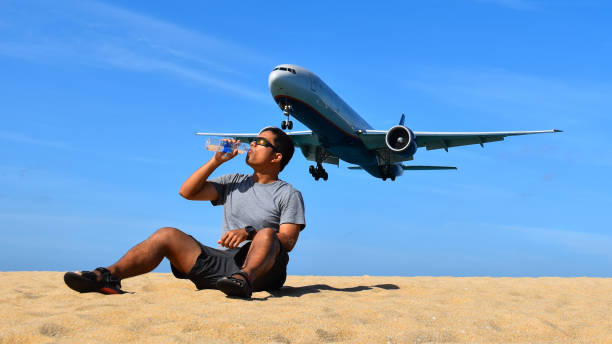 istock concept: lost in the desert and the airplane in background 661409408