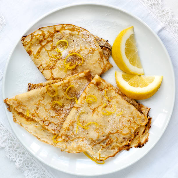 istock Crepes with Lemon and Sugar Top View 661409472