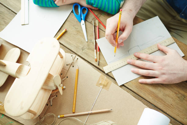 istock Making sketch of toy plane 661410310