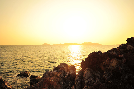 Summer Beach with Sunset Silhouette