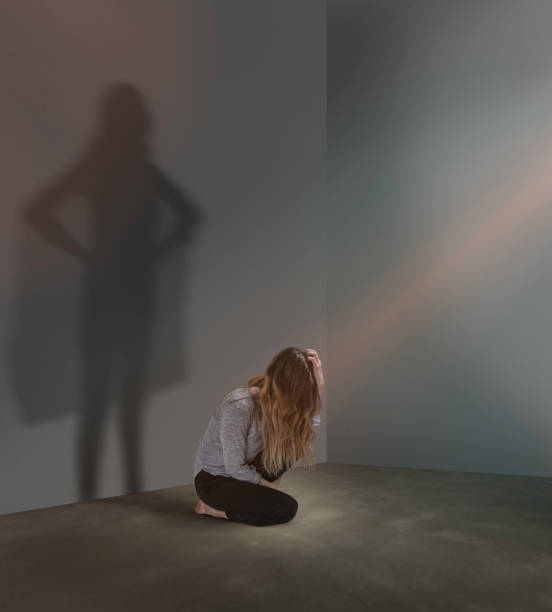 istock Woman shadow is confident and brave 661415990