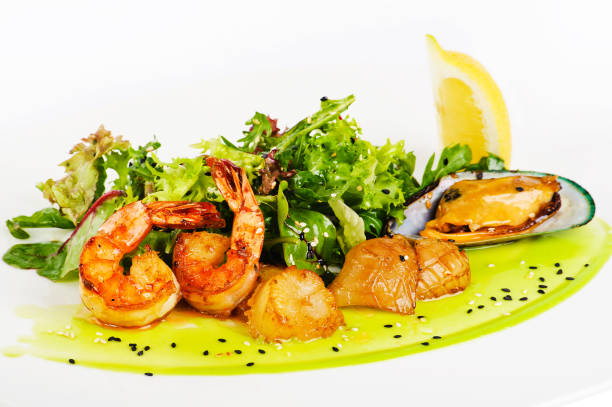 istock Seafood salad on a white background 661423332