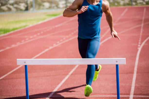 istock Athlete ready to jump a hurdle 661425880