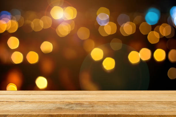 istock empty wooden shelves on blur bokeh background 661435908