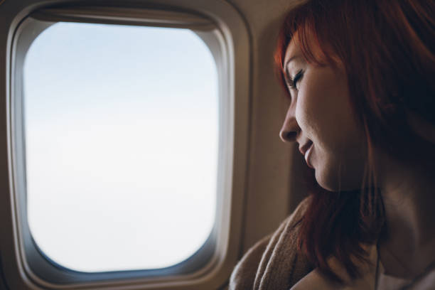 istock Woman enjoying the flight 661436568