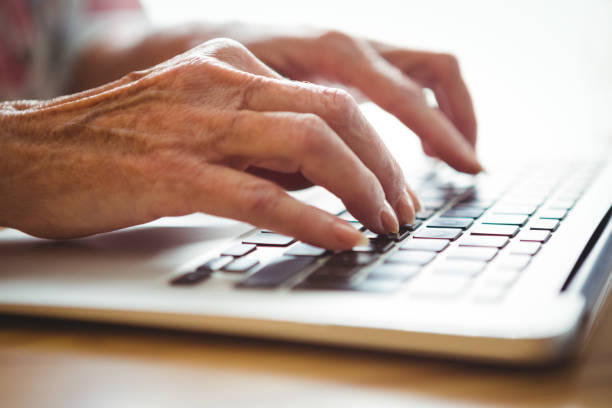 istock Close-up of hands typing on a laptop keyboard 661443690