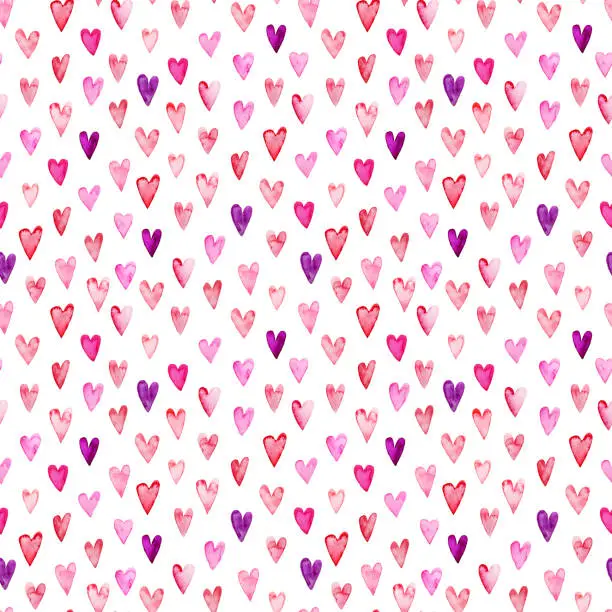 Photo of Seamless pattern with pink watercolor hearts.