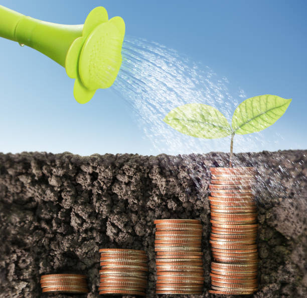 istock Coins graph stock market 661447056