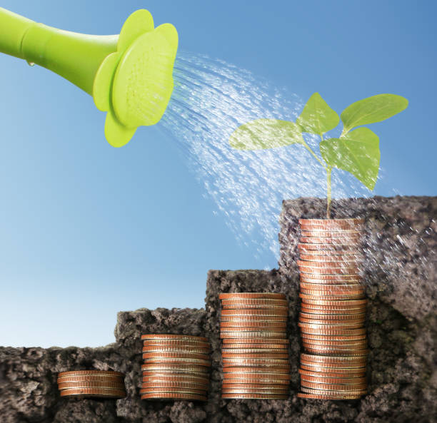 istock Coins graph stock market 661447060