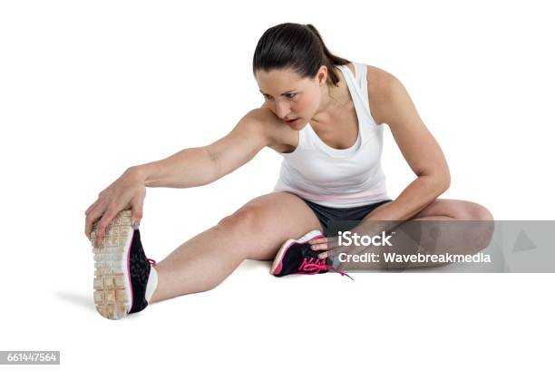 Hamstring Woman Athlete Woman Stretching Her Hamstring Stock Photo - Download Image Now ...