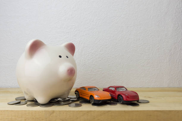 istock piggy bank with car and coins 661449908