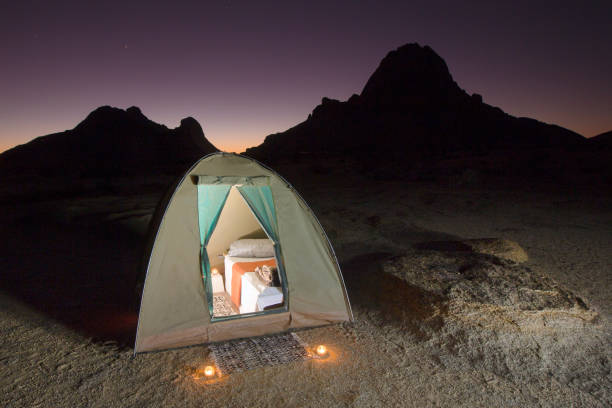 A tent kitted out with luxury bed and bedding A tent kitted out with luxury bed and bedding swakopmund photos stock pictures, royalty-free photos & images