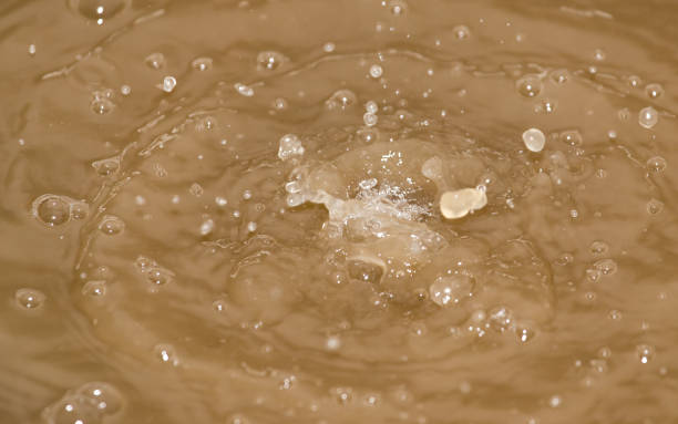 istock Drops of water falling into the dirty water 661456174