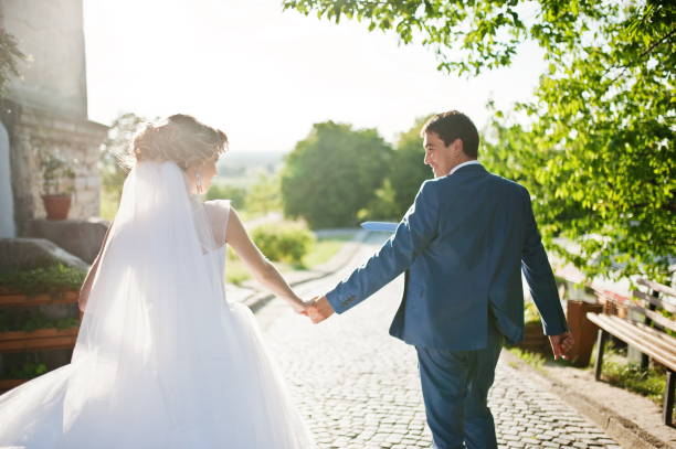 istock Tender wedding couple background old architecture of castle 661460818