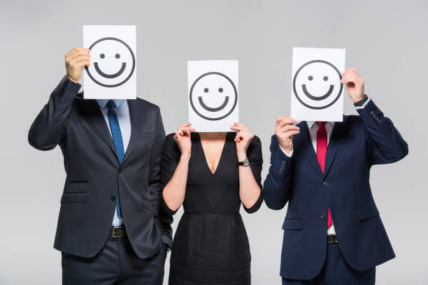 istock Businesspeople holding cards 661474602