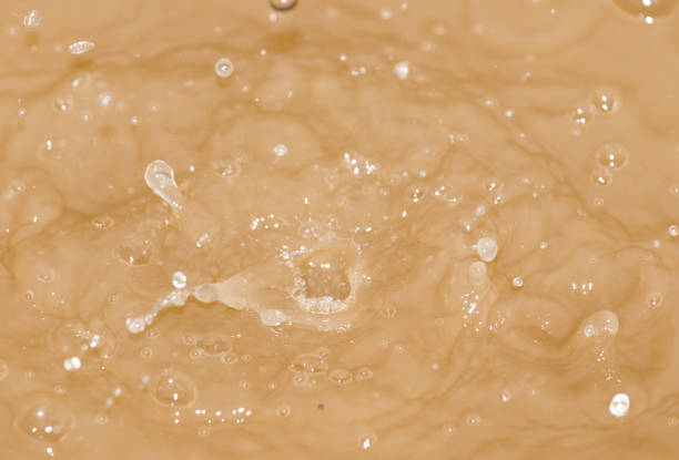 istock Drops of water falling into the dirty water 661474870