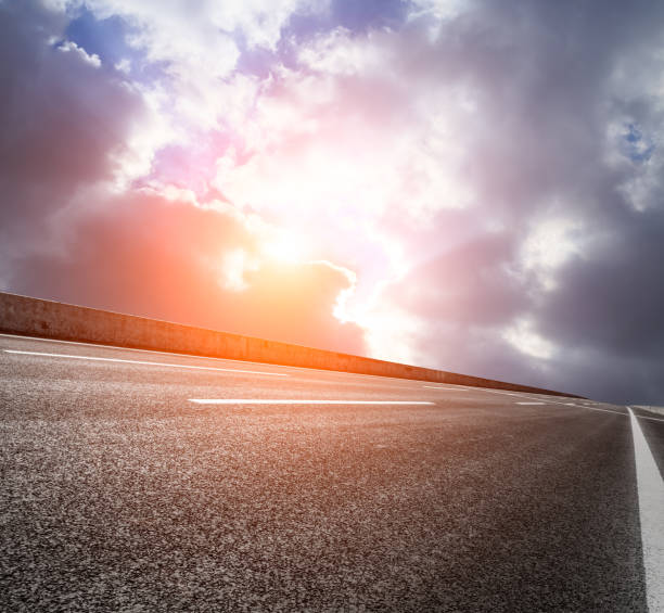 istock Asphalt road and sky at sunset 661477714