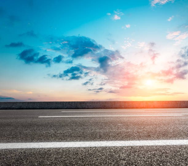 istock Asphalt road and sky at sunset 661477992